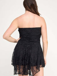 Back view of Plus Size Ots Lace Overlay Assym Dress showcasing the lace detailing and asymmetrical hem.
