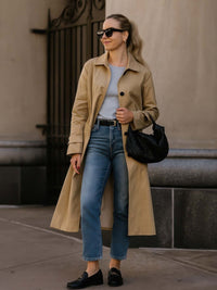 Solid Long Sleeve Trench Coat Woman Lined worn with casual jeans and flats, showcasing modern elegance and style.