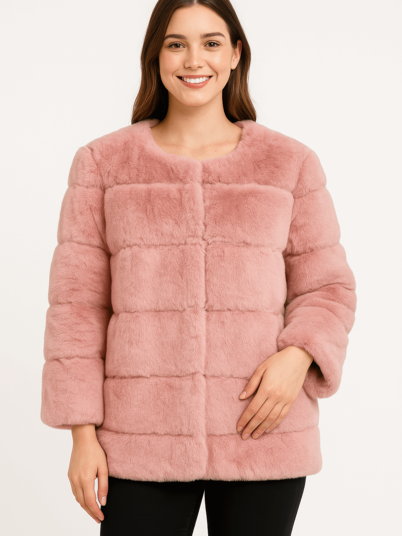 Model wearing a stylish plush camel faux fur jacket with a collarless neckline and horizontal paneling.