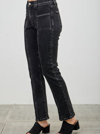 Mid Rise Slim Straight In Black Acid showcasing a sleek black acid wash denim silhouette.