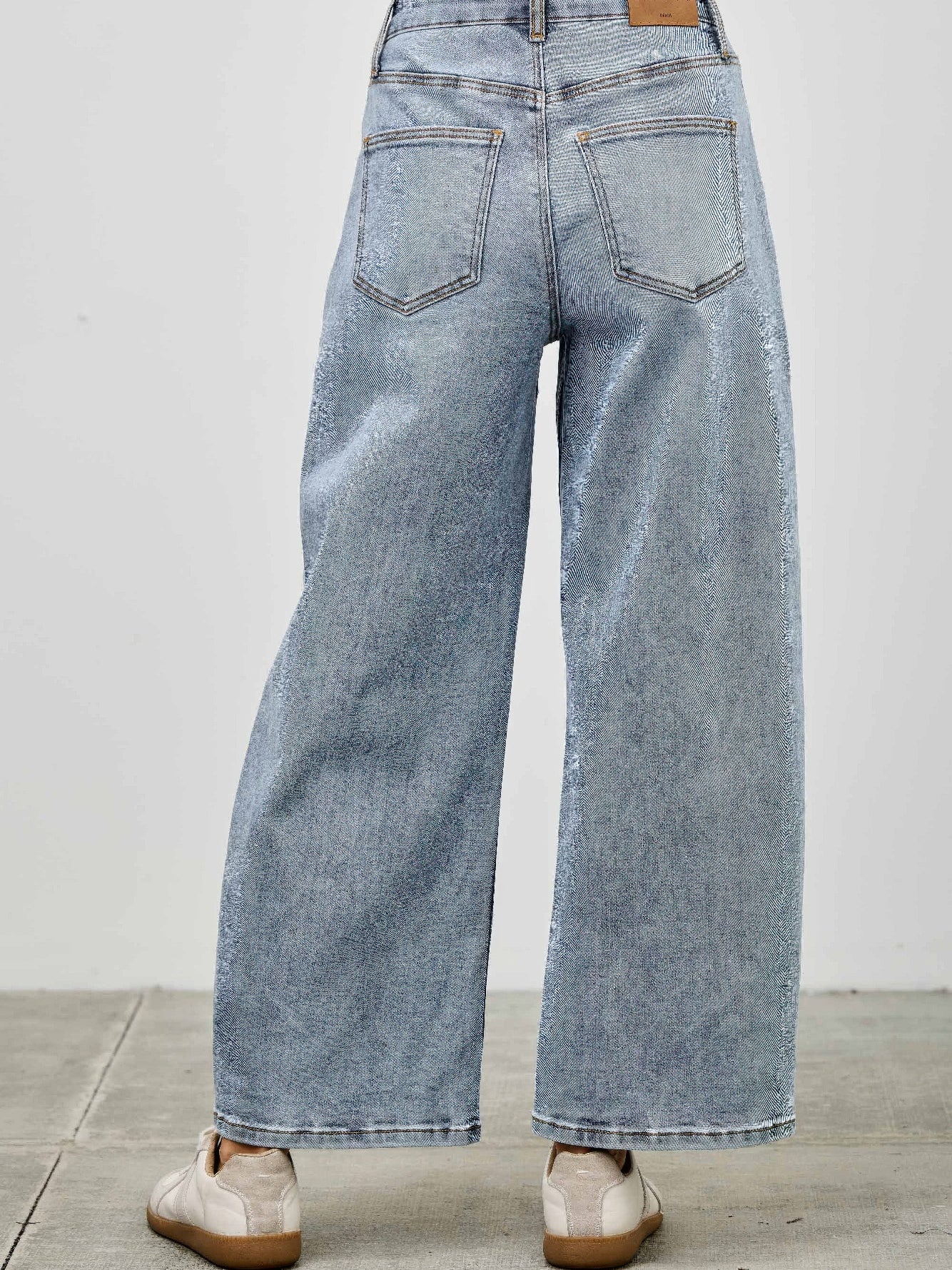 Back view of High Rise Low Curve Barrel jeans showcasing their roomy barrel leg and high-rise waist.