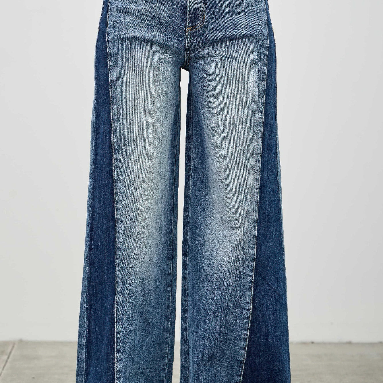 High Rise Wide Leg W/release Hem And Side Contrast featuring a raw hem and side contrast paneling.