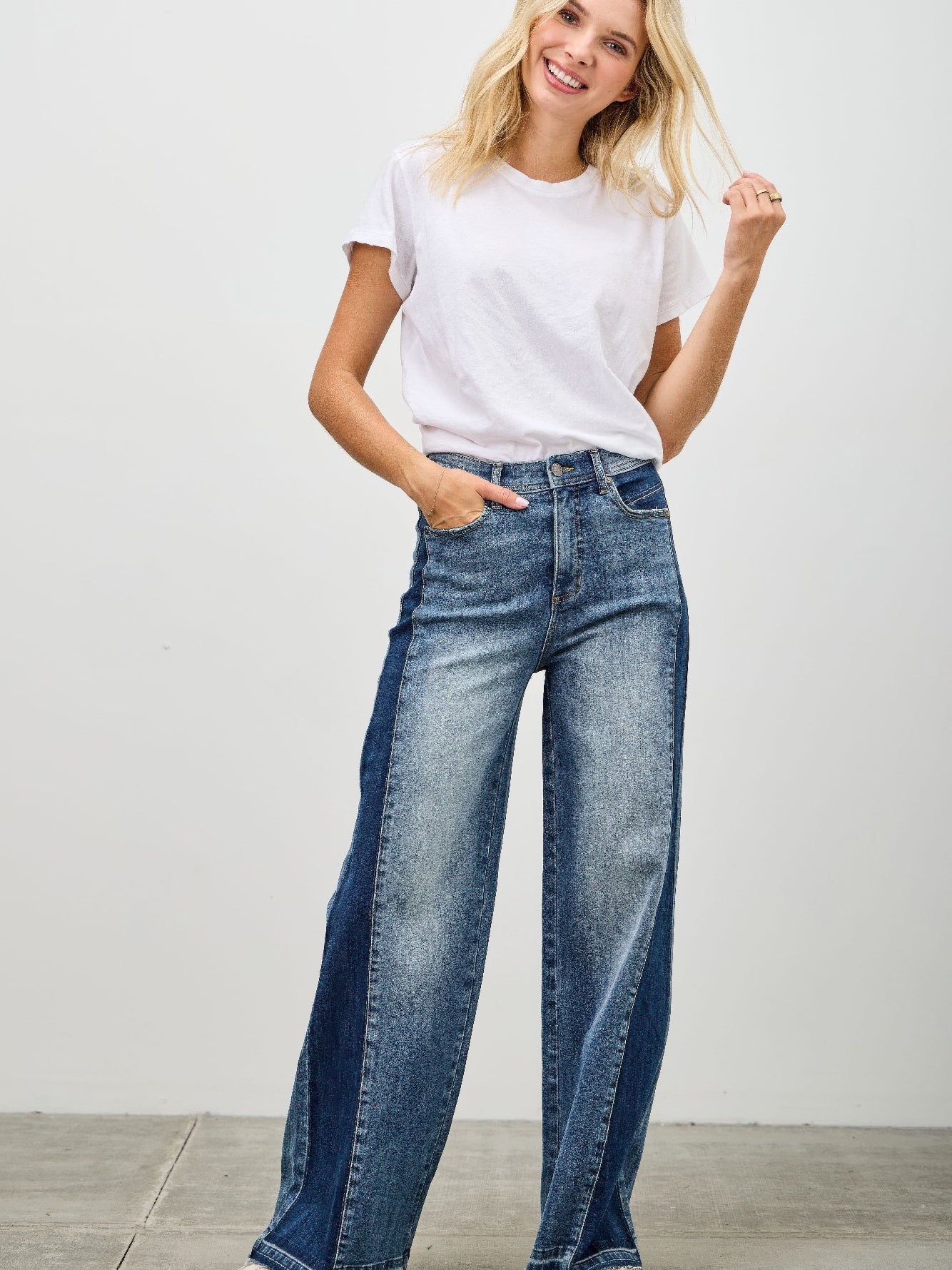 High Rise Wide Leg W/release Hem And Side Contrast on a model showcasing a relaxed fit with contrasting side panels.