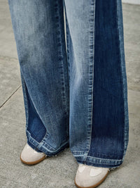 High Rise Wide Leg W/release Hem And Side Contrast showcasing raw hem and side contrast paneling.