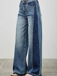High Rise Wide Leg W/release Hem And Side Contrast featuring raw hem and contrast paneling in denim.
