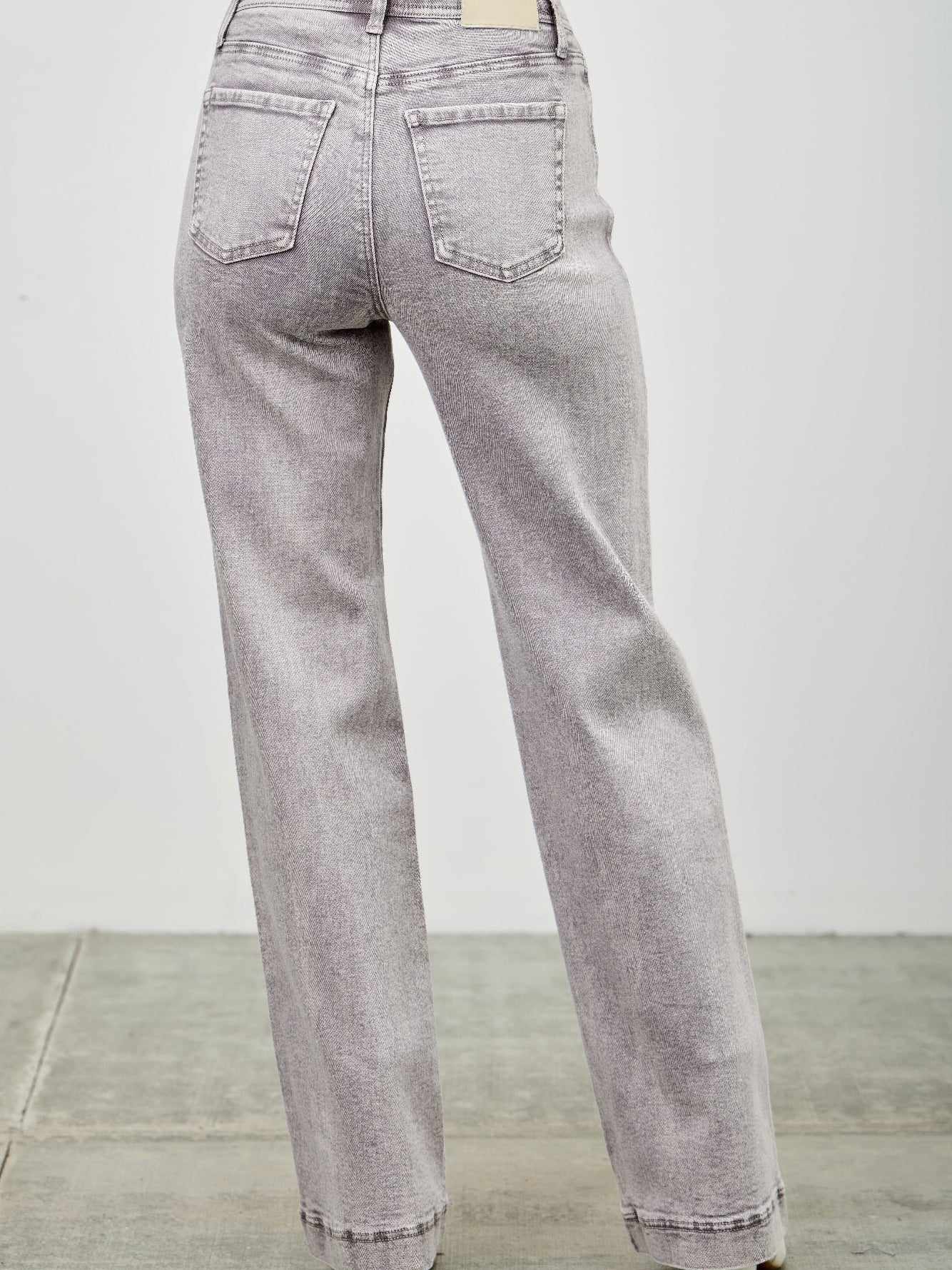 High Rise Slim Wide Straight jeans viewed from the back, showcasing the high-rise waist and straight leg design.