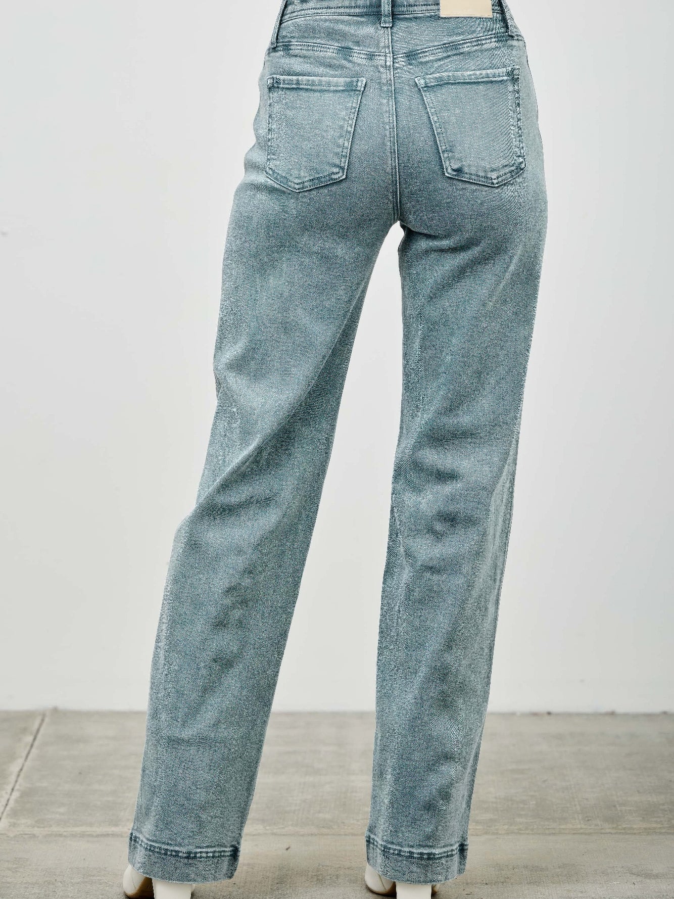 Back view of High Rise Slim Wide Straight jeans showcasing the stylish ankle-length and flattering fit.