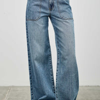 High Rise Double Pocket Wide Leg jeans featuring patched front pockets and a wide leg silhouette.