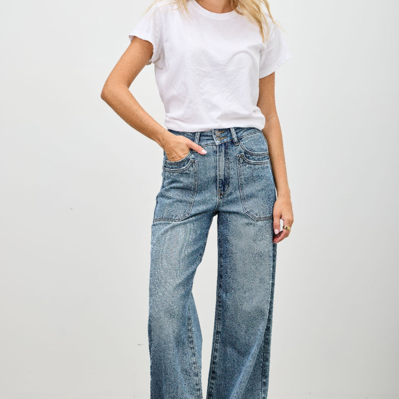 High Rise Double Pocket Wide Leg jeans styled with a casual white t-shirt and relaxed footwear.