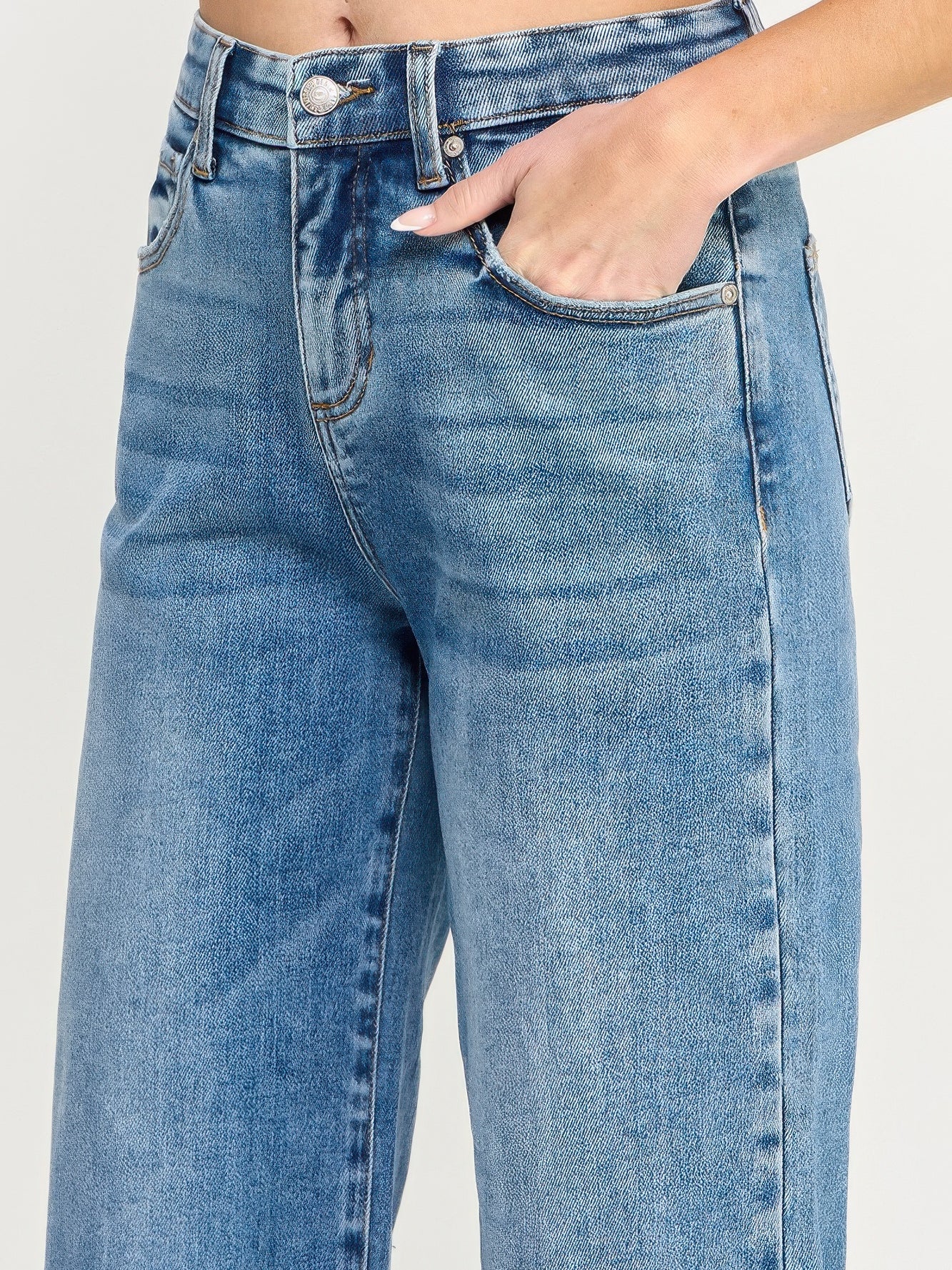 Tummy Control High Rise Crop Wide W/ Released Hem featuring a relaxed fit and high-rise waistband with tummy control.