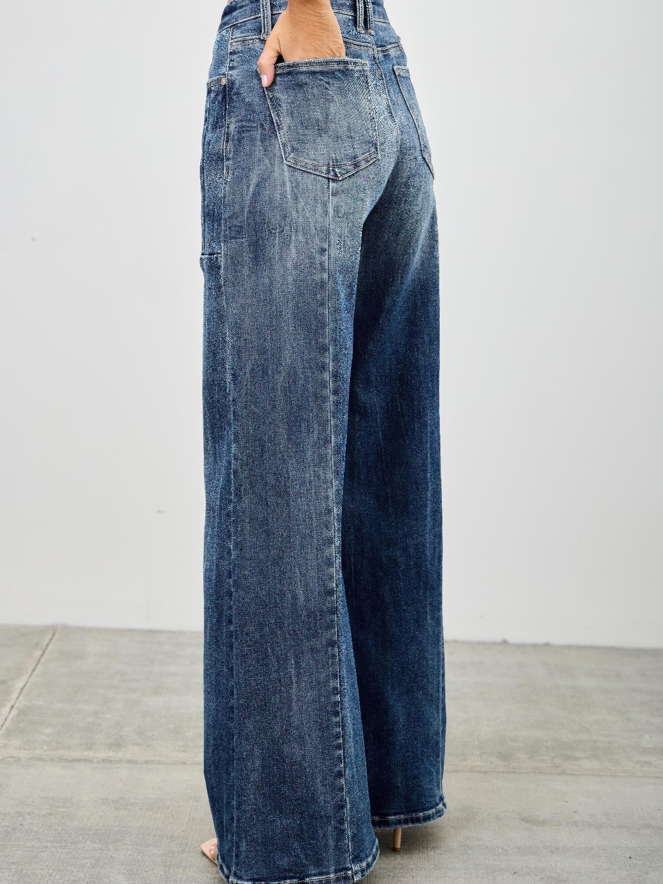 Mid Rise Wid Leg jeans in a relaxed fit with wide leg silhouette, showcasing modern style and comfortable denim blend.