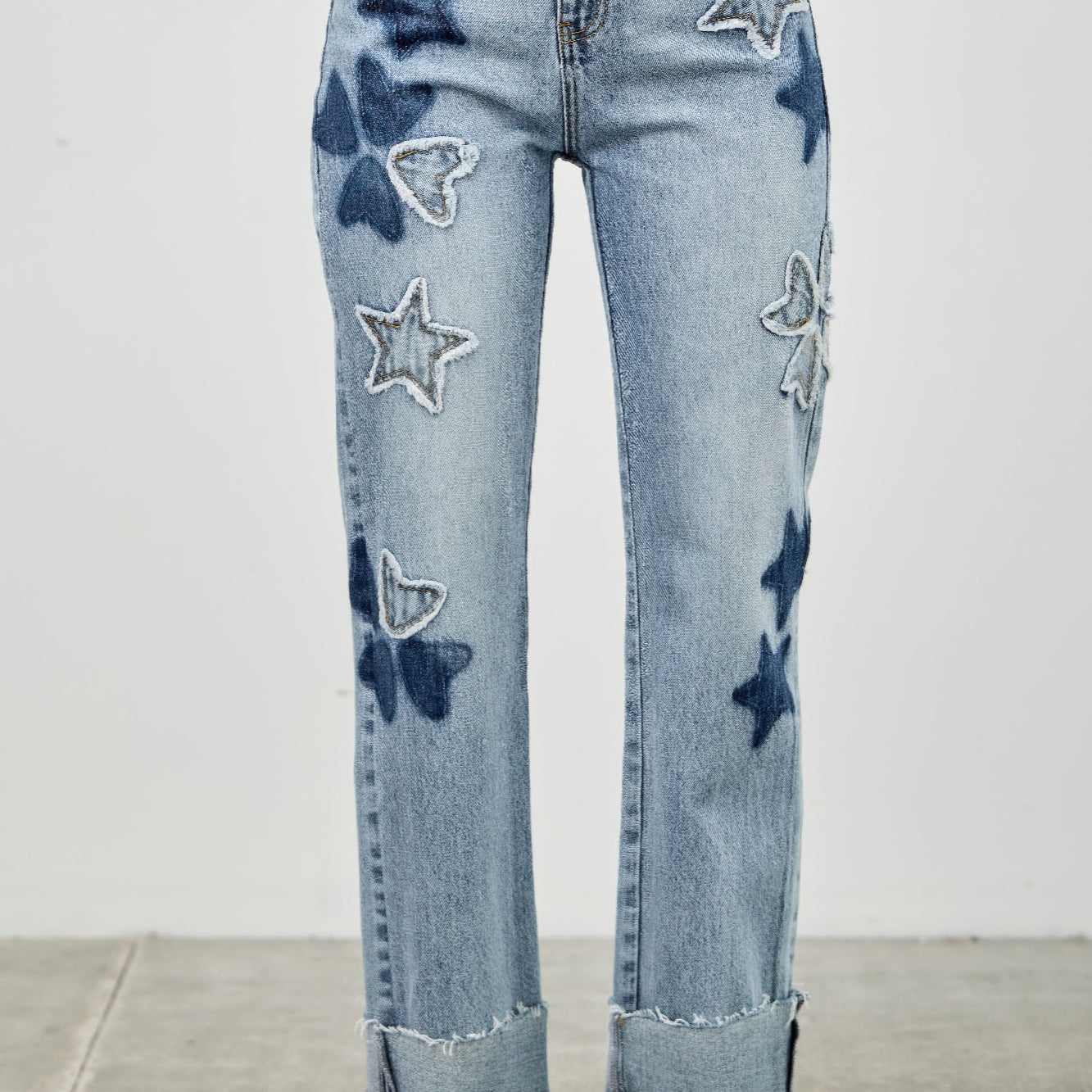 High Rise Star & Heart Patched Dad Jean W/stretch featuring star and heart patches with a relaxed fit.