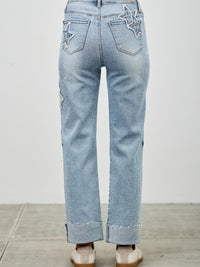 High Rise Star & Heart Patched Dad Jean W/stretch shown from the back, featuring playful star patches and a relaxed fit.