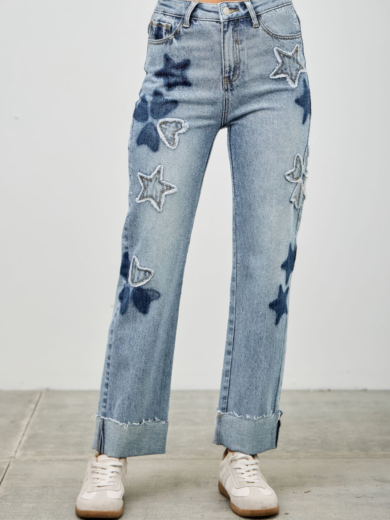 High Rise Star & Heart Patched Dad Jean W/stretch featuring playful star patchwork on light wash denim.