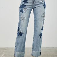 High Rise Star & Heart Patched Dad Jean W/stretch featuring playful star patchwork on light wash denim.