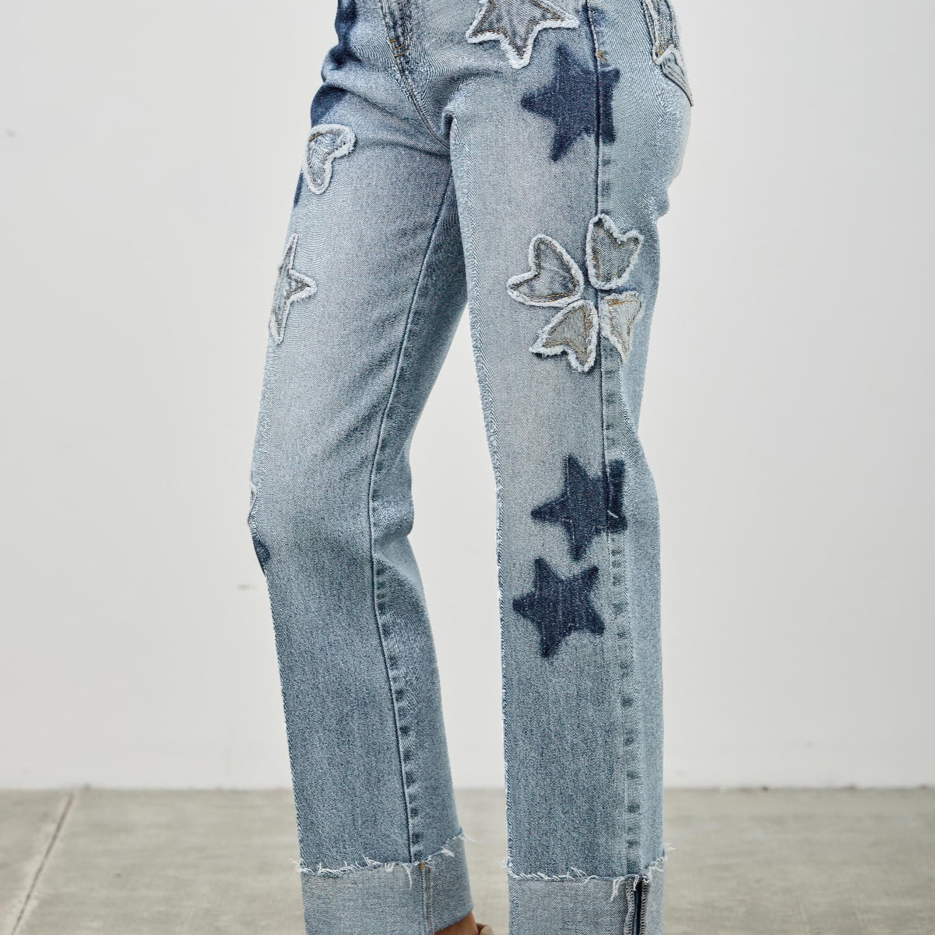 High Rise Star & Heart Patched Dad Jean W/stretch featuring playful star patches in a relaxed fit.