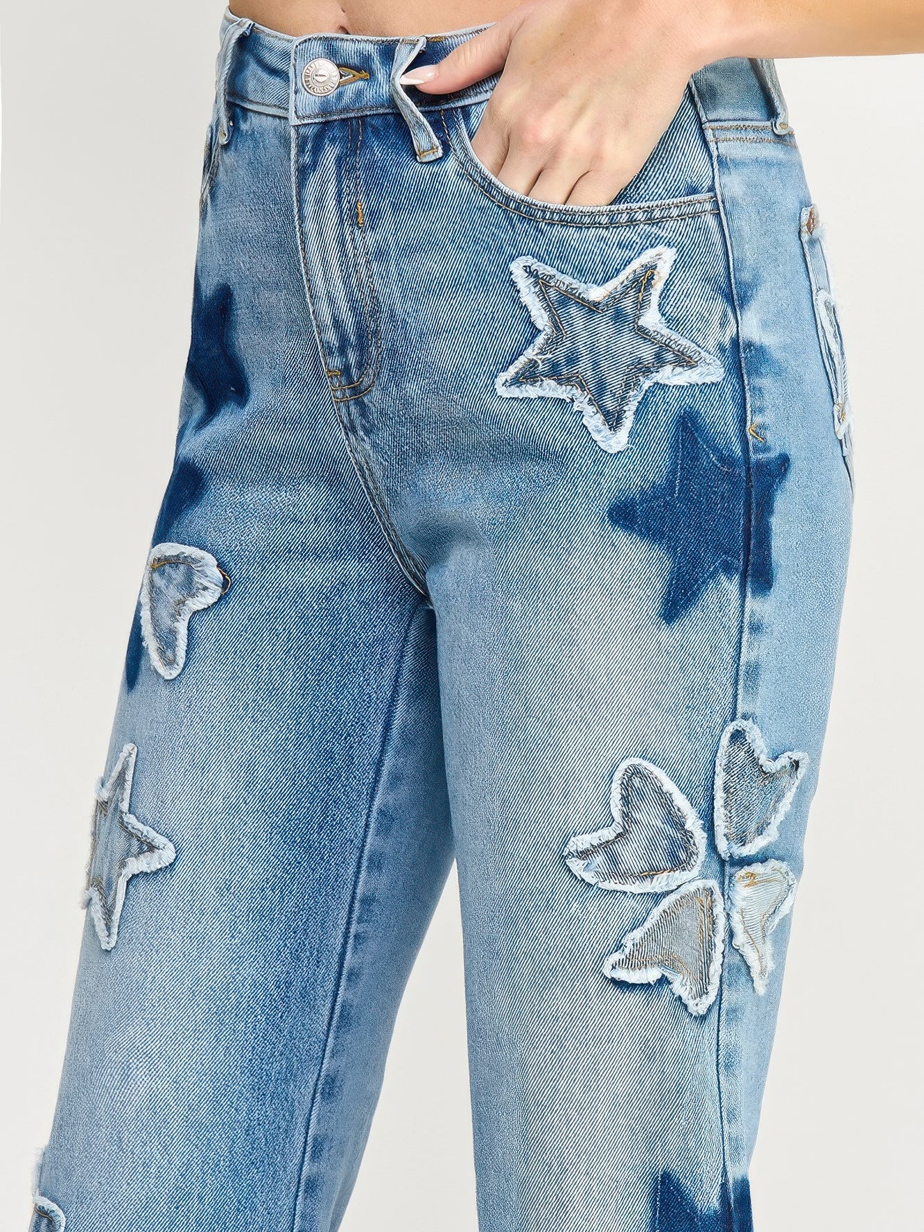 High Rise Star & Heart Patched Dad Jean W/stretch featuring playful star patchwork on light denim.