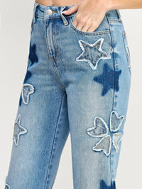 High Rise Star & Heart Patched Dad Jean W/stretch featuring playful star patchwork on light denim.