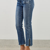 Mid Rise Skinny Crop Tummy Control jeans featuring a flattering fit and stylish cropped length.