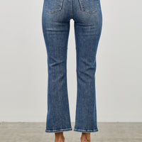 Back view of Mid Rise Skinny Crop Tummy Control jeans showcasing a flattering fit and stylish cropped length.