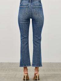 Back view of Mid Rise Skinny Crop Tummy Control jeans showcasing a flattering fit and stylish cropped length.