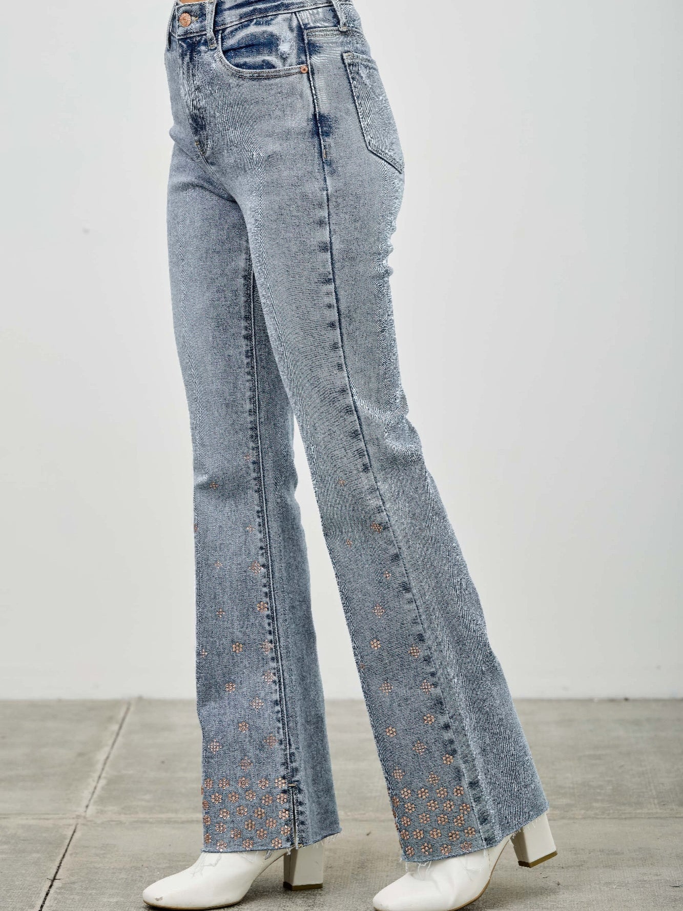 High Rise Kick Flare With Rhinestone jeans featuring subtle rhinestone embellishments and a flattering fit.
