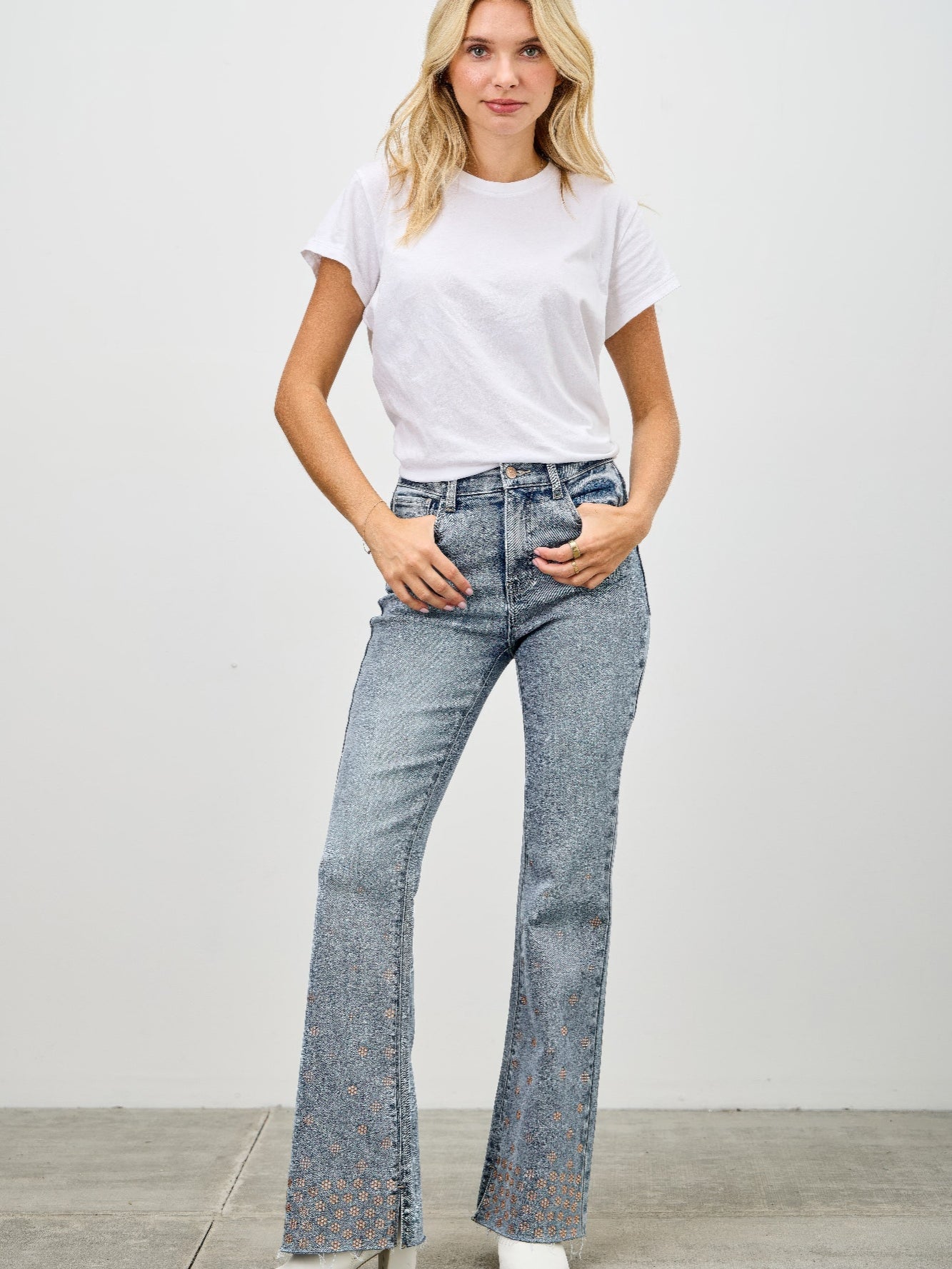 High Rise Kick Flare With Rhinestone worn by a model, styled with a white tee and showcasing subtle rhinestone details.