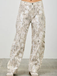 High Rise Low Curve Barrel jeans with a unique printed design and contemporary silhouette, showcasing a flattering high-rise fit.