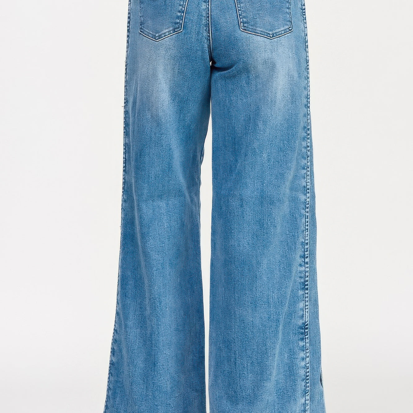 High Rise Wide Leg With Tummy Control jeans showcasing a flattering wide leg silhouette from the back.