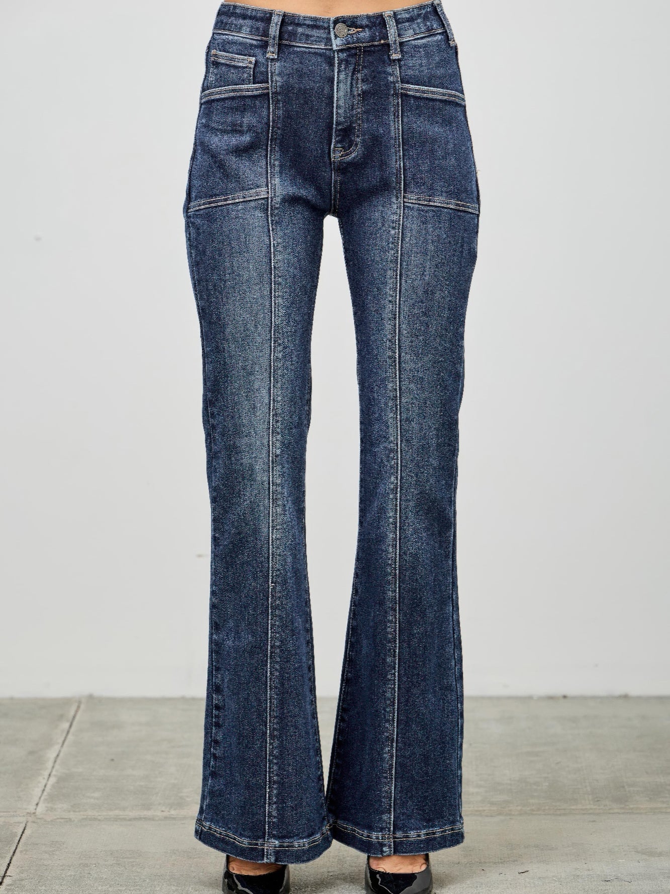 High Rise Boot Cut With Seam Detail jeans in blue denim featuring a flattering fit and classic five-pocket design.