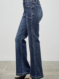 High Rise Boot Cut With Seam Detail feature a modern silhouette in soft, stretchy denim, perfect for a flattering fit.