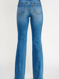 Back view of Tummy Control Mid Rise Skinny Bootcut jeans showcasing the flattering bootcut silhouette.