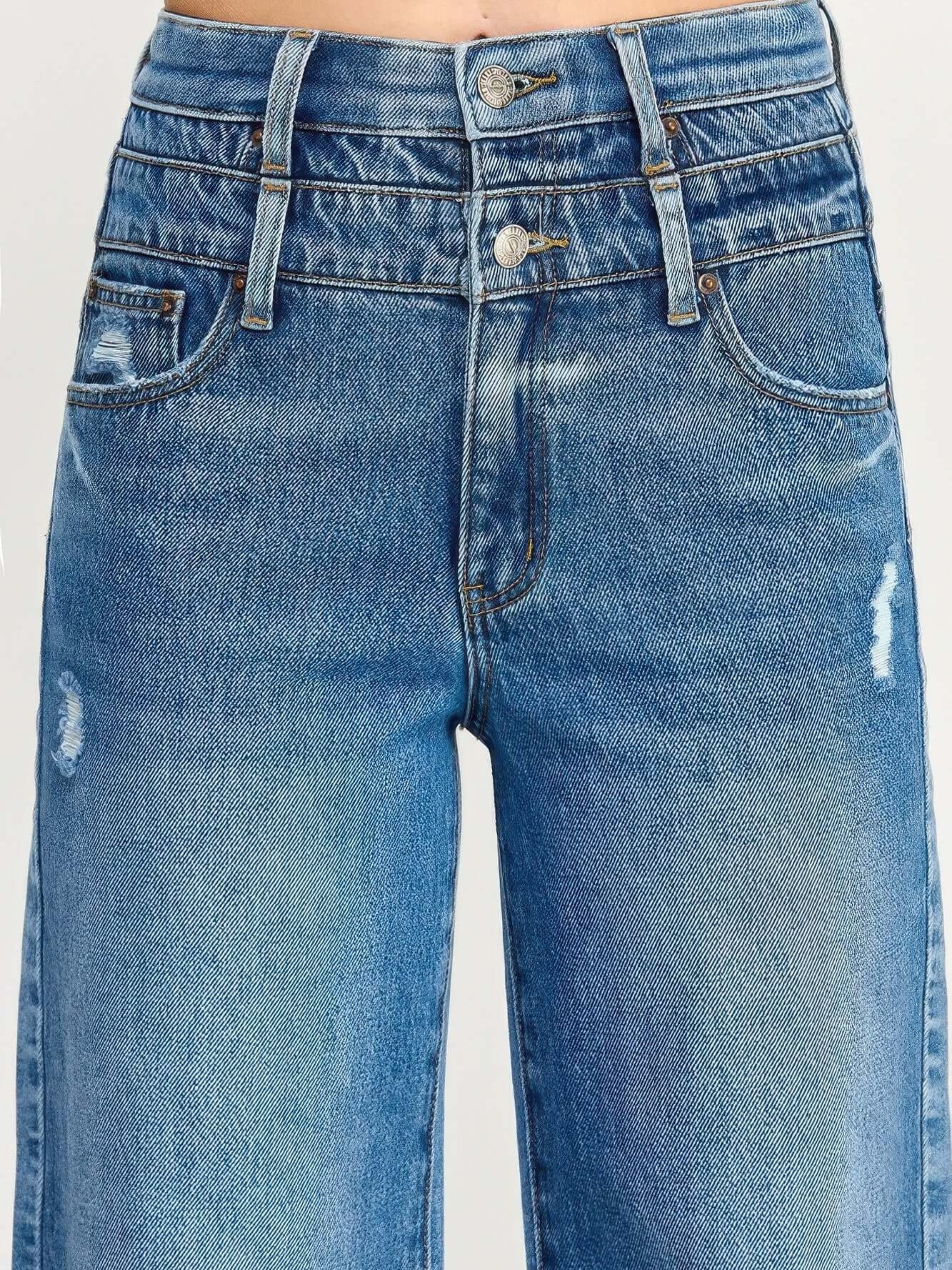 High Rise Double Waist Wide Leg jeans featuring a unique double waistband and wide leg cut in a stylish blue denim.