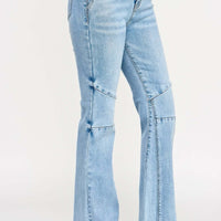 High Rise Flare With Seam Detail showcasing a sleek fit and elongating seam accents in soft denim.