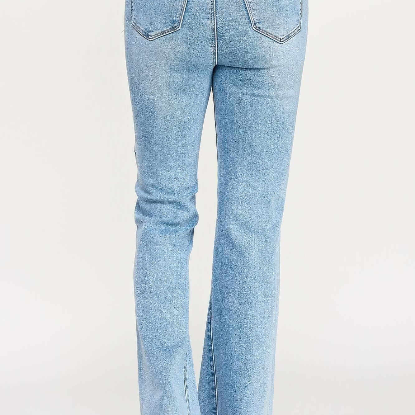 High Rise Flare With Seam Detail - Back view of high rise flare jeans with seam details and flared hem.