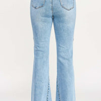 High Rise Flare With Seam Detail showcasing the back view of stylish blue flare jeans with seam accents.