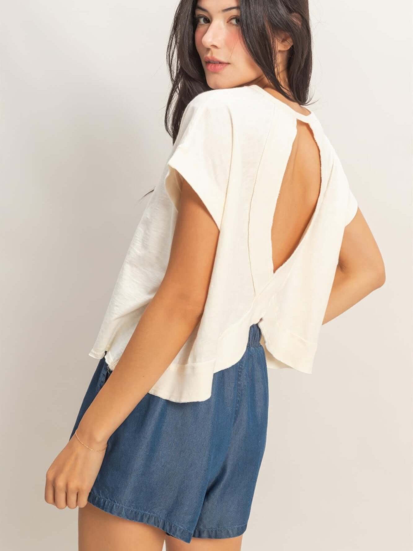 Acid Washed Cross Detail Open Back Top showcasing an open back design and relaxed fit, perfect for casual outings.