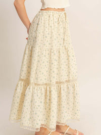 Tiered Lace Trim Skirt featuring a flowing silhouette and delicate lace detail for feminine charm.