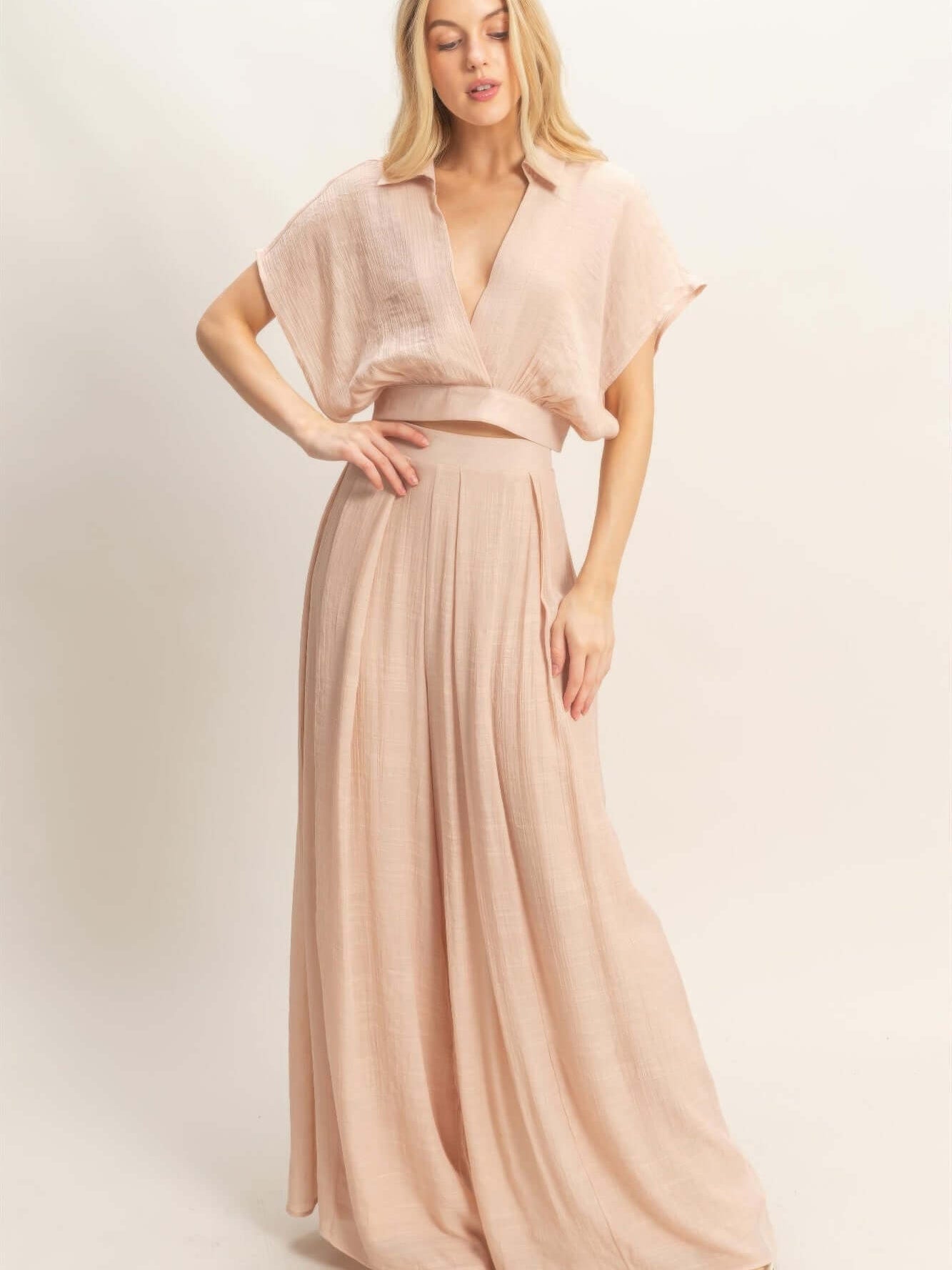 Collared Wrap Top & Wide-leg Pants Set in soft cotton-blend fabric, showcasing modern elegance and flowing design.