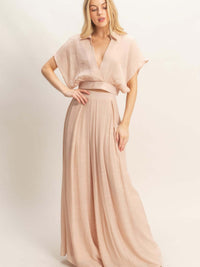 Collared Wrap Top & Wide-leg Pants Set in soft cotton-blend fabric, showcasing modern elegance and flowing design.