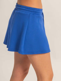 Wrap Front Elastic Waist Skort in vibrant blue with an elastic waistband for comfort and ease of movement.