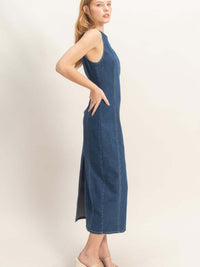 Sleeveless Denim Midi Dress showcased on a model, featuring a fitted silhouette and modern design with side slits.