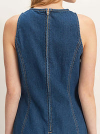Back view of a sleeveless denim midi dress showcasing the zipper detail and clean lines.