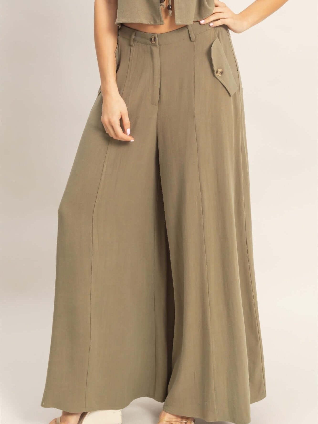Wide-leg Flap Pocket Pants in olive green with flap pockets and a structured silhouette.