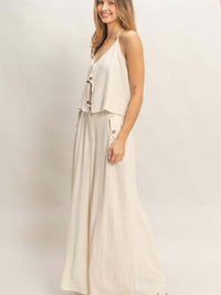 Wide-leg Flap Pocket Pants worn by a model, showcasing a stylish wide-leg silhouette and flap pockets.