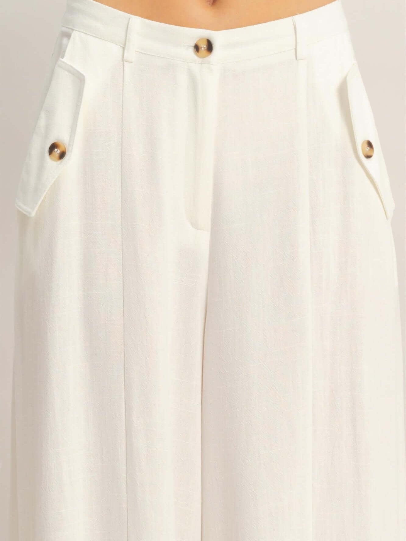 Wide-leg Flap Pocket Pants with structured silhouette and flap pockets, showcasing a breathable rayon-linen blend.