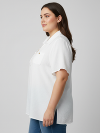 White knit utility top with collared zip-front and chest pocket detail, short sleeves