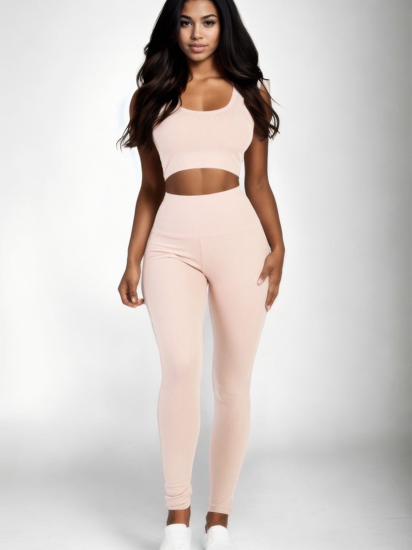Ribbed Crop Top & Leggings Set in soft pink color, showcasing modern style and comfort for active wear.