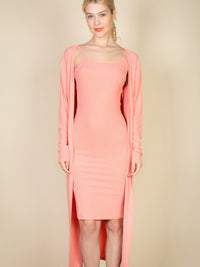 Ribbed cardigan and cami dress set in soft pink with a flattering fit, perfect for stylish comfort.