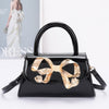 Faux Leather Metal Ribbon Top Handle Bag